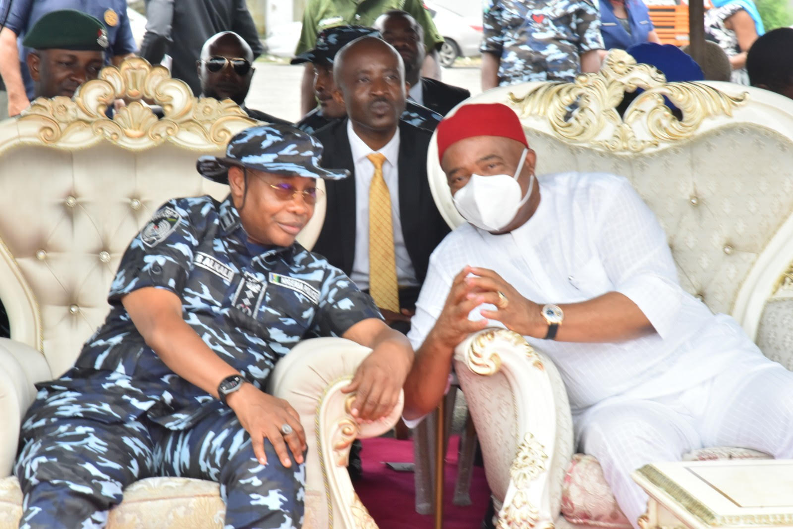 IG of Police, Usman Baba Alkali with Governor Hope Uzodimma and others as he cuts the tape to Commission 10 APC Security Vehicles and other Gadgets donated by the Governor to the Nigerian Police in Owerri...Tuesday.