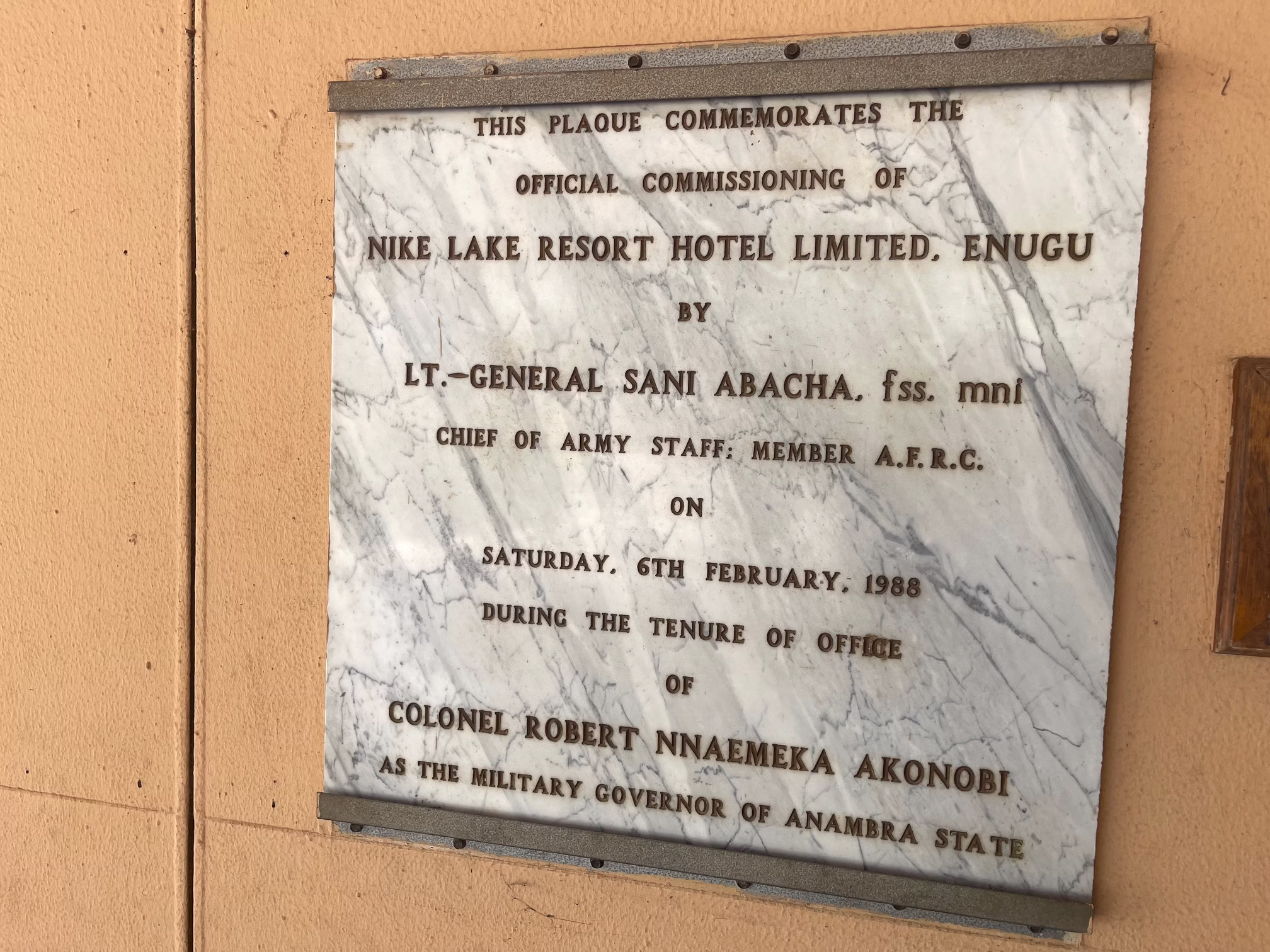 The plaque about the official commissioning of the resort
